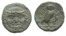 Sicily, Kamarina, c. 420-405 BC. Æ Onkia (10mm, 1.06g, 12h). Facing gorgoneion. R/ Owl standing r., head facing, grasping lizard in talons. CNS III, 4...