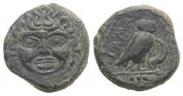 Sicily, Kamarina, c. 420-405 BC. Æ Tetras (16mm, 4.02g, 3h). Gorgoneion. R/ Owl standing r., head facing, grasping lizard. CNS III, 12; SNG ANS 1221-3...