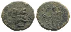Sicily, Katane, c. 2nd century BC. Æ (24mm, 11.32g, 12h). Janiform head of Serapis; three monograms around. R/ Demeter standing l., holding grain ears...