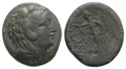 Thrace, Lysimacheia, c. 309-220 BC. Æ (23mm, 10.64g, 12h). Head of Herakles r., wearing lion skin. R/ Nike standing l., holding wreath and palm; two m...