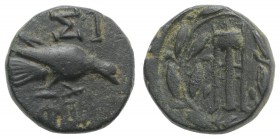 Sikyon, c. 225-200 BC. Æ Trichalkon (14mm, 3.27g, 11h). Dove feeding r. R/ Tripod-lebes within wreath tying below. BCD Peloponnesos 318.5. Green patin...