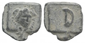 Roman PB Tessera, c. 1st century BC - 1st century AD (17mm, 3.26g, 12h). Winged head of Medusa facing. R/ Large D within rectangular frame. VF