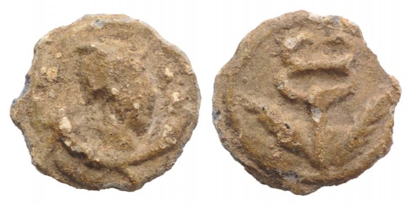 Roman PB Tessera, c. 1st century BC - 1st century AD (13mm, 2.08g, 12h). Head of...