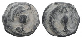 Roman PB Tessera, c. 1st century BC - 1st century AD (12mm, 2.30g, 12h). Helmeted head of Minerva(?) r. R/ Standard or shaft. Rostowzew 2891. About VF