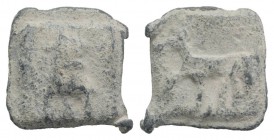 Roman PB Tessera, c. 1st century BC - 1st century AD (15mm, 4.37g, 6h). Bucranium. R/ Horse stepping l. VF
