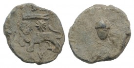 Roman PB Tessera, c. 1st century BC - 1st century AD (12mm, 2.40g, 6h). Lion advancing l., head facing; above, letter over animal leg(?) and star; bel...
