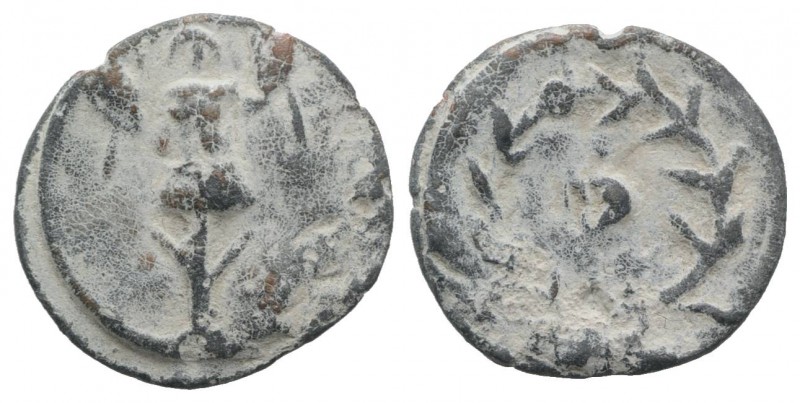 Roman PB Tessera, c. 1st century BC - 1st century AD (19mm, 3.55g). Trophy. R/ S...