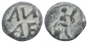 Roman PB Tessera, c. 1st century BC - 1st century AD (14mm, 2.90g, 12h). AN/AF. R/ Figure standing l., holding cornucopia and sacrificing(?) over alta...