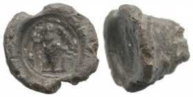 Roman PB Seal, c. 2nd-3rd century AD (19mm, 22.11g). Figure standing r.; holding sceptre. R/ Blank.