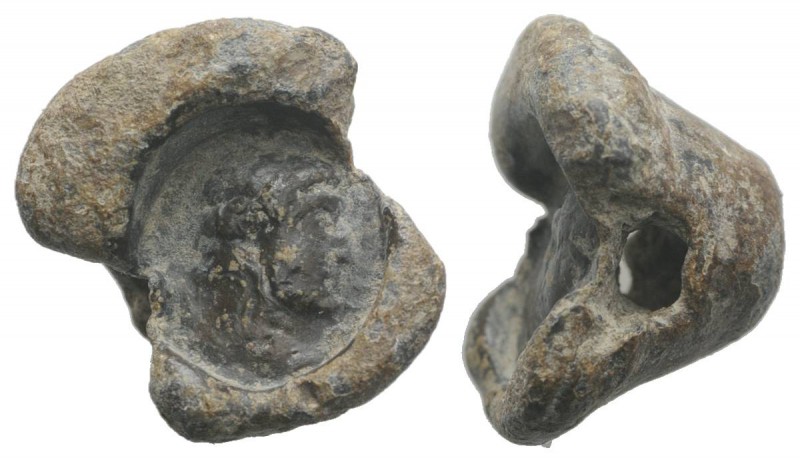 Roman PB Seal, c. 2nd-3rd century AD (19mm, 15.41g). Head of Antinous(?) r. R/ B...