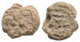Roman PB Tessera, c. 2nd-4th century AD. PB Tessera (14mm, 4.19g). Figure standing r. R/ Legend in two lines. Near VF