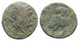 Etruria, Uncertain, late 3rd century BC. Æ (14mm, 2.31g, 3h). Laureate head of Aplu; quiver at shoulder. R/ Owl facing three-quarters r. HNItaly 74. V...