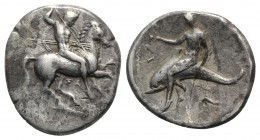 Southern Apulia, Tarentum, c. 315-302 BC. AR Nomos (23mm, 7.38g, 9h). Warrior, holding shield and two spears, preparing to cast a third, on horseback ...