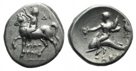 Southern Apulia, Tarentum, c. 272-240 BC. AR Nomos (21mm, 6.32g, 3h). Youth on horseback l., placing wreath on horse's head; ΦIΛΩ/TAC in two lines bel...