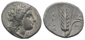 Southern Lucania, Metapontion, c. 325-275 BC. AR Stater (22mm, 7.77g, 6h). Head of Demeter r., wearing grain-ear wreath and earring; ΔA[I] below chin....
