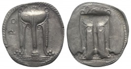 Bruttium, Kroton, c. 530-500 BC. AR Stater (29mm, 8.21g, 12h). Tripod, legs terminating in lion's feet, serpents rising from bowl. R/ Incuse tripod as...