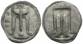 Bruttium, Kroton, c. 530-500 BC. AR Stater (30mm, 8.98g, 12h). Tripod, legs terminating in lion's feet, serpents rising from bowl. R/ Incuse tripod as...