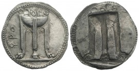 Bruttium, Kroton, c. 530-500 BC. AR Stater (30mm, 7.93g, 12h). Tripod, legs terminating in lion's feet, serpents rising from bowl. R/ Incuse tripod as...
