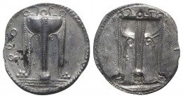 Bruttium, Kroton, c. 530-500 BC. AR Stater (29mm, 6.70g, 12h). Tripod, legs terminating in lion's feet, serpents rising from bowl. R/ Incuse tripod as...