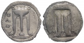 Bruttium, Kroton, c. 530-500 BC. AR Stater (30mm, 7.60g, 12h). Tripod, legs terminating in lion's feet, serpents rising from bowl. R/ Incuse tripod as...