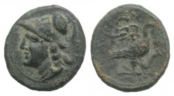 Bruttium, Lokroi Epizephyrioi, c. 281-272 BC. Æ (12.5mm, 1.70g, 11h). Helmted head of Athena l. R/ Eagle standing r. on thunderbolt, with wings spread...