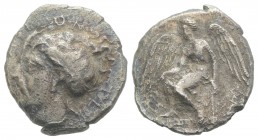 Bruttium, Terina, c. 425-400 BC. AR Stater (21mm, 7.27g, 5h). Head of the nymph Terina l. R/ Nike seated l. on cippus, holding kerykeion. Cf. HNItaly ...