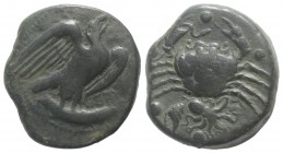 Sicily, Akragas, c. 415-406 BC. Æ Hemilitron (28mm, 20.55g, 6h). Eagle standing r. on tunny. R/ Crab; conch shell and octopus below, six pellets aroun...