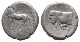 Sicily, Gela, c. 420-415 BC. AR Tetradrachm (23.5mm, 16.98g, 13h). Charioteer driving walking quadriga l.; above, Nike flying r., crowning charioteer;...