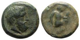 Sicily, Petra, 354/3-344 BC. Æ Litra (32mm, 33.58g, 6h). Bearded head of Zeus Eleutherios r. R/ Aphrodite seated r., playing with dove held in her r. ...