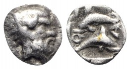 Island of Thrace. Thasos, c. 412-404 BC. AR Hemiobol (7mm, 0.37g, 7h). Head of satyr r. R/ Two dolphins in shallow incuse square. Le Rider, Thasiennes...