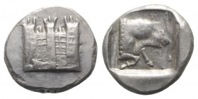 Asia Minor, Uncertain southern mint, 5th century BC. AR Stater (21mm, 10.89g, 1h). Crenelated city wall with three towers. R/ Forepart of bull advanci...
