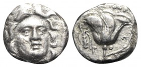 Islands of Caria, Rhodos. Rhodes, c. 340-316 BC. AR Hemidrachm (12mm, 1.96 g, 12h). Head of Helios facing slightly r. R/ Rose with bud to r.; club to ...