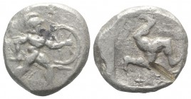 Pamphylia, Aspendos, c. 465-430 BC. AR Stater (20mm, 10.89g). Warrior, nude but for helmet, holding sword and shield, advancing r. R/ Triskeles within...