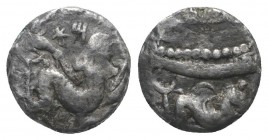Phoenicia, Arados. Uncertain king, c. 440-420 BC. AR Third Stater – Tetrobol (12mm, 2.62g, 6h). Ba’al-Arwad r., holding dolphin in each hand. R/ Galle...