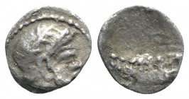 Phoenicia, Arados. Uncertain king, c. 380-351/0 BC. AR Obol (9mm, 0.81g, 12h). Head of marine deity r., wearing laurel wreath. R/ Galley r.; waves bel...