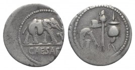 Julius Caesar, military mint traveling with Caesar, April-August 49 BC. AR Denarius (18mm, 3.85g, 9h). Elephant advancing r., trampling on horned serp...
