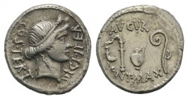 Julius Caesar, Utica(?), 46 BC. AR Denarius (19mm, 3.82g, 6h). Head of Ceres r., wearing wreath of grain. R/ Emblems of the augurate and pontificate: ...