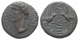 Claudius (41-54). Phoenicia, Berytus. Æ (18mm, 5.39g, 12h). Laureate head l. R/ Two aquilae facing one another; two signa behind, vertical V/VIII betw...