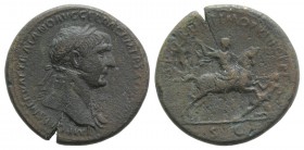 Trajan (98-117). Æ Sestertius (34mm, 23.77g, 6h). Rome, c. 104/5-107. Laureate bust r., wearing aegis. R/ Trajan on horseback riding r., thrusting spe...