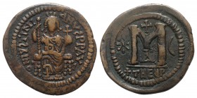 Justinian I (527-565). Æ 40 Nummi (34mm, 18.35g, 6h). Theoupolis (Antioch), c. 529-533. Justinian seated facing on throne, holding sceptre and globus ...
