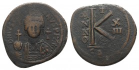 Justinian I (527-565). Æ 20 Nummi (32mm, 16.05g, 2h). Carthage, year 13 (539/40). Diademed, helmeted and cuirassed facing bust, holding globus crucige...