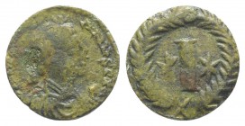 Justinian I (527-565). Æ 10 Nummi (15mm, 2.84g). Rome, c. 545. Diademed, draped and cuirassed bust r. R/ Large I between two stars; all within wreath....