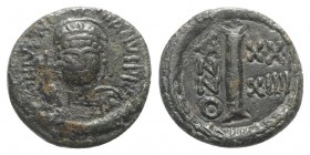 Justinian I (527-565). Æ 10 Nummi (16mm, 2.95g, 6h). Ravenna, year 34 (560/1). Diademed, helmeted and cuirassed facing bust, holding globus cruciger a...