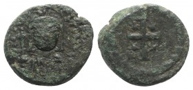 Justinian I (527-565). Æ 10 Nummi (17mm, 5.47g). Uncertain mint. Helmeted and cuirassed bust facing, holding globus cruciger and shield. R/ Large cros...