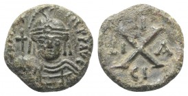 Maurice Tiberius (582-602). Æ 10 Nummi (14mm, 2.77g, 6h). Syracuse, 588-602. Helmeted, draped and cuirassed bust facing, holding long cross. R/ Large ...