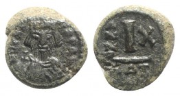 Heraclius (610-641). Æ 10 Nummi (14mm, 4.25g, 6h). Catania, year 10 (619/20). Crowned, draped and cuirassed bust facing, holding globus cruciger. R/ L...