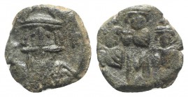 Constans II (641-668). Æ 40 Nummi (18mm, 3.75g, 12h). Constantinople, 666-668. Helmeted bust of Constans facing, holding globus cruciger; K to r. R/ L...