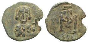 Justinian II (First reign, 685-695). Æ 40 Nummi (22mm, 3.91g, 6h). Syracuse, 689-690. Crowned and draped facing bust, holding akakia and globus crucig...