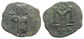 Justinian II (First reign, 685-695). Æ 40 Nummi (23mm, 3.75g, 6h). Syracuse, c. AD 686. Justinian standing facing, wearing crown and chlamys, holding ...
