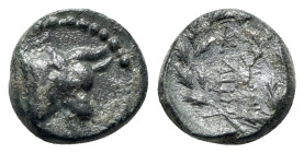 Mysia, Kyzikos, 2nd-1st centuries BC. Æ (11mm, 1.81g, 9h). Head of bull r. R/ Monogram; ethnic at corners; all within wreath. Cf. SNG BnF 485. VF